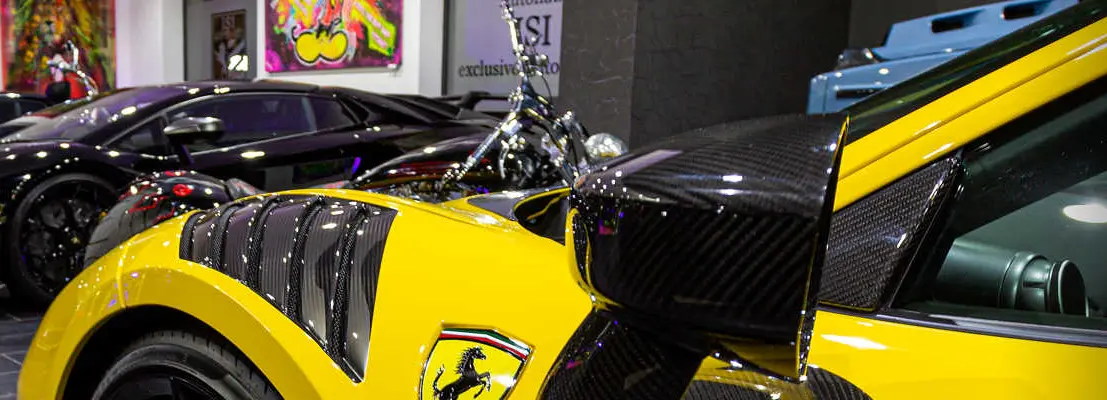 Yellow sports car with carbon elements in the showroom